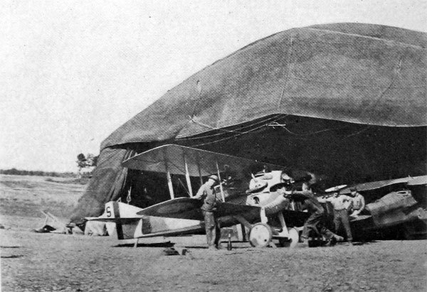 Tuning up a Spad in a Field Hangar at the Front U. S. Air Service Photo 