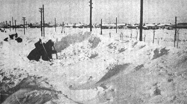 RUSSIAN CIVILIANS, clearing drifted snow, Ukraine, 1942 